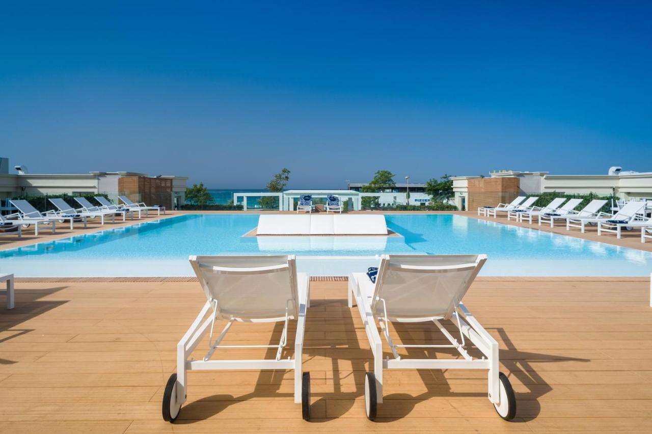 Le Dune Suite Hotel Porto Cesareo Bagian luar foto